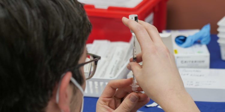 person with syringe